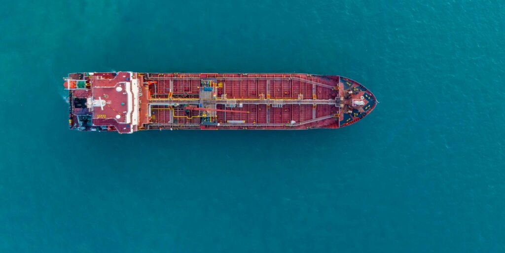 Aerial top view of oil tanker ship at sea, Crude oil tanker industrial, Oil tanker import export.