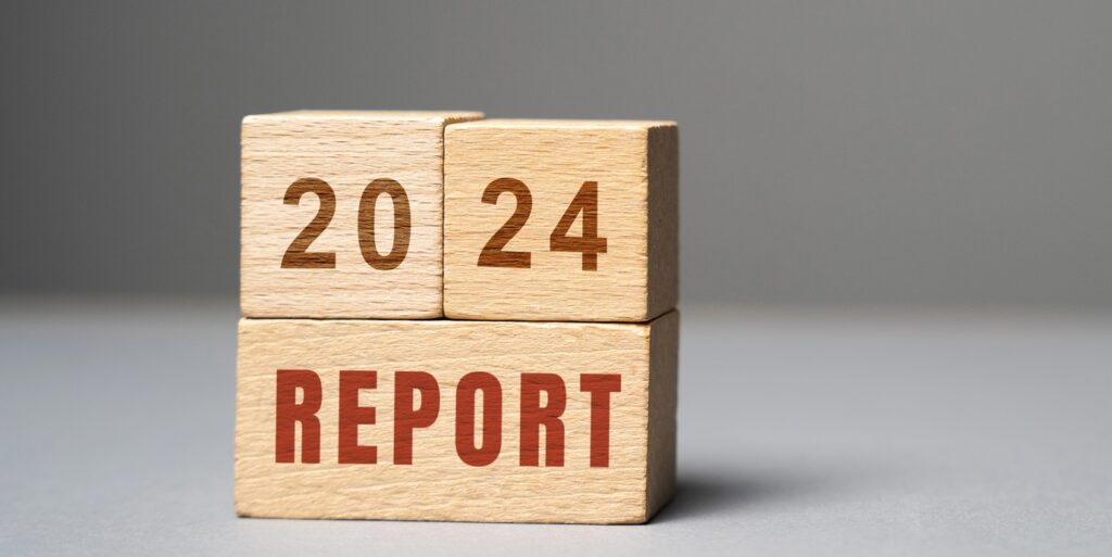 2024 report in wooden blocks.