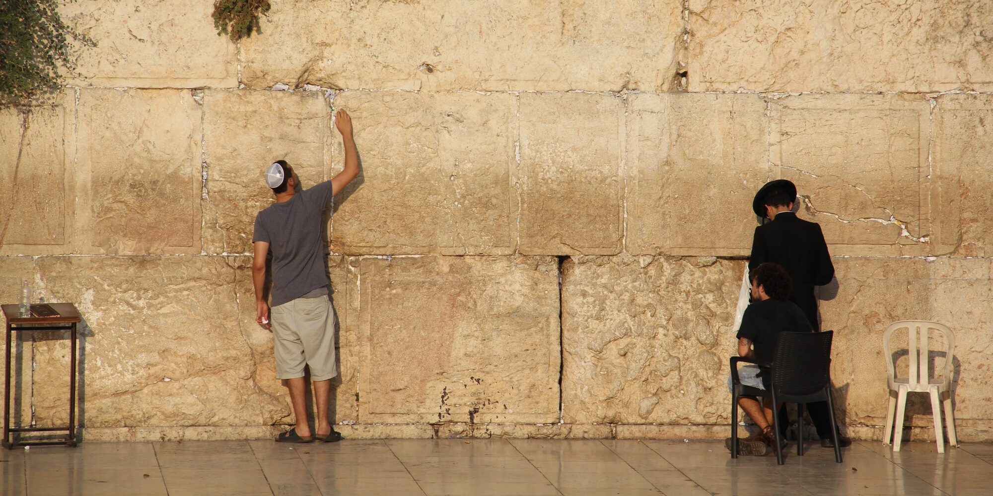Jewish people praying to the Jerusalem's western wall, the wailing wall